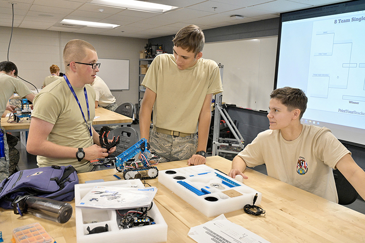 A small group of Civil Air Patrol cadets work on assembling a robot Tuesday, June 28, at MTSU, which again is hosting the cadets for the U.S. Air Force volunteer civilian auxiliary’s National Cadet Engineering Technology Academy, also known as E-Tech, which runs June 26 through July 2 on the campus. (MTSU photo by Andy Heidt)