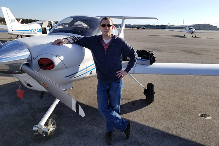 Travis Houser, recent graduate of Middle Tennessee State University’s Aeronautical Science master’s program, poses in January 2018 at the Murfreesboro Airport in Murfreesboro, Tenn., after completing his very first flight as part of one of the university’s various aviation programs. (Photo courtesy of Travis Houser)