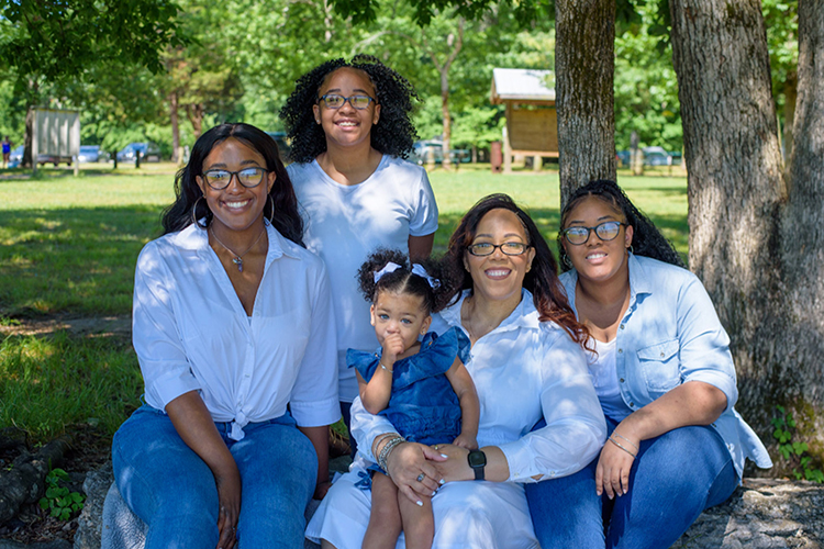 MTSU senior Pashion Wofford, 46, of Antioch, Tenn., second from right, holds her baby niece Loreca, whom she is raising as her daughter, in this undated family photo. Also pictured, from left, are Wofford’s daughters, Christian, Gracen and Ziona. Wofford is set to graduate in August with her bachelor’s in integrated studies after returning to college as a nontraditional student after years away from the classroom. Christian is set to start MTSU this fall majoring in education. (Submitted photo)