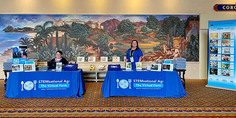 Jill Thomas, left, project coordinator for the MTSU Center for Health and Human Services, and center staffer Michelle Sterlingshires promote "STEMsational Ag: The Virtual Farm" at the 11th annual Building Expertise Educators' Conference in Orlando, Florida, the week of June 20.