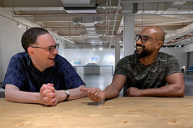 Sean Foley, an MTSU professor of history, enjoys a laugh with comedian Khalid Moss prior to the March 2022 concert Foley and Department of Recording Industry Chair John Merchant put together in Jeddah, Saudi Arabia.