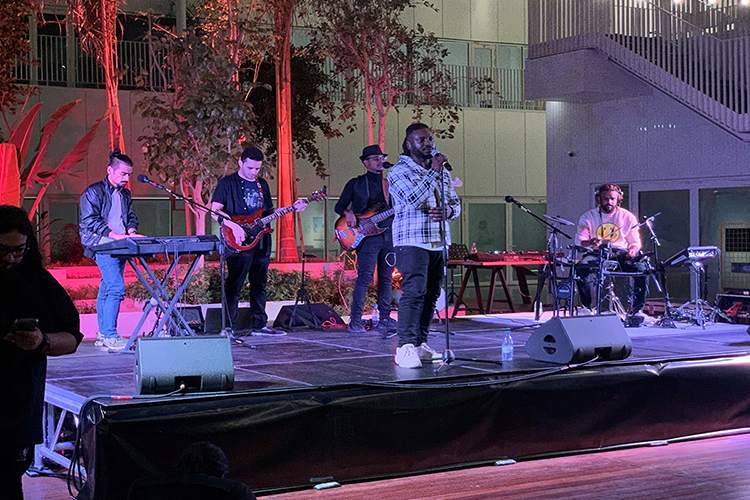 Hamza Hawsawi, center, winner of the 2015 X-Factor Middle East competition, performs at the March 2022 concert of contemporary Saudi music at Hayy Jameel Cultural Center in Jeddah, Saudi Arabia. History professor Sean Foley and Department of Recording Industry chair John Merchant staged the concert.