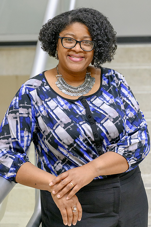 Dr. Leah Tolbert Lyons, dean of Middle Tennessee State University's College of Liberal Arts, pauses for a photo on the stairwell of the Todd Building shortly after her appointment to the college's top post was finalized. Lyons, an MTSU alumna, has taught French language, literature and film at her alma mater since 2001 and now leads a college comprising 11 departments ranging from art, dance and languages to global studies, sociology and political science and offering more than 20 academic majors. (MTSU file photo by James Cessna)