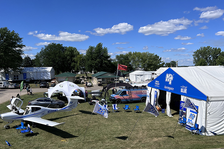 Middle Tennessee State University’s exhibition and informational tent about its highly regarded Aerospace Department is shown on the grounds of the 2022 EAA AirVenture in Oshkosh, Wis. (MTSU photo by Andrew Oppmann)