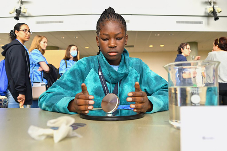 MTSU has hosted numerous STEM-related events for youngsters over the years. In this file photo from April 2002, Lexi Tut performs a physics experiment in a "Physics Phun" workshop as part of the 25th annual Tennessee Girls in STEM Conference in the Science Building Saturday, April 9. The STEM Summer Camp scheduled for July 11-15 will engage students in similar close encounters with science, technology, engineering and technology.