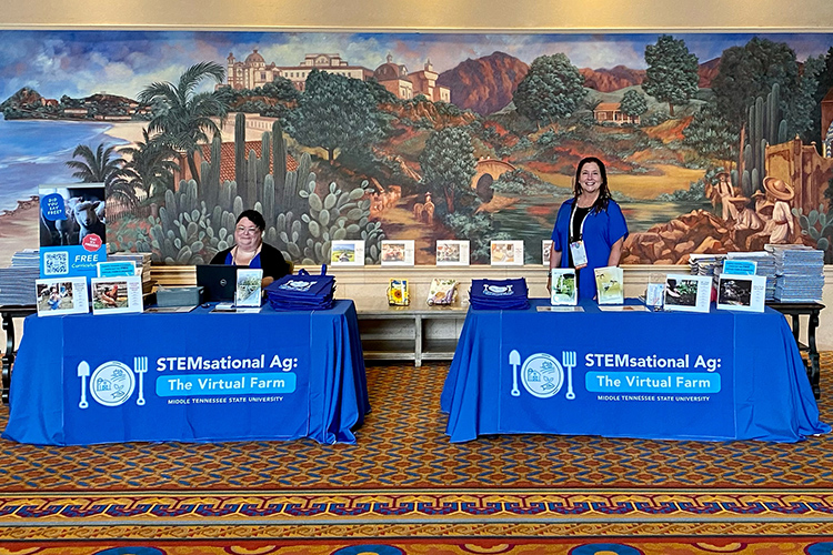 Jill Thomas, left, project coordinator for the MTSU Center for Health and Human Services, and center staffer Michelle Sterlingshires promote "STEMsational Ag: The Virtual Farm" at the 11th annual Building Expertise Educators' Conference in Orlando, Florida, the week of June 20. (Photo submitted)