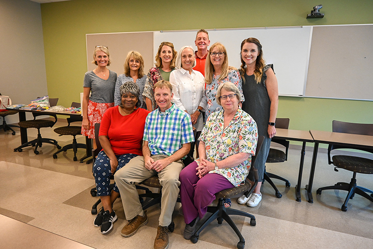 Middle Tennessee State University faculty Jeremy Winters, center front, Dovie Kimmins, far right front, and Katie Schrodt, far right back, partnered with Murfreesboro City Schools on Project Optimal, training an inaugural cohort of MCS teachers in math literacy over the past year and wrapping up the final five of 10 total days at the College of Education this summer. (MTSU photo by Stephanie Barrette)