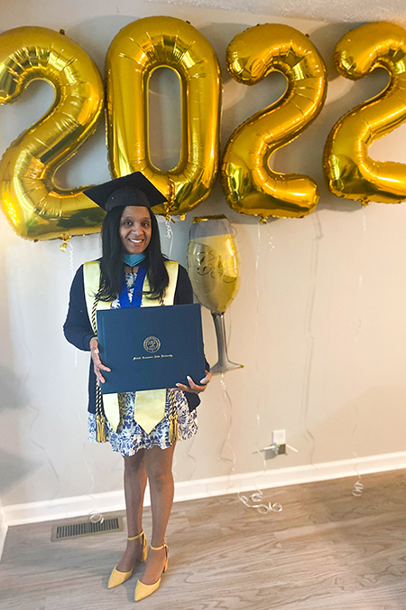 MTSU spring 2022 graduate Zaheerah Smith-Cooper strikes a post-graduation pose in this May photo. She recently graduated with her daughter, Aminah Smith, from Middle Tennessee State University’s College of Education with top marks and as a nontraditional student from the Master of Education in Curriculum and Instruction program. (Photo courtesy of Zaheerah Smith-Cooper)