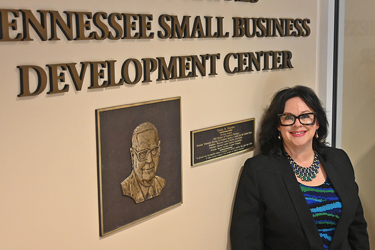 MTSU alumna Amelia Bozeman, shown here at entrance to the Tennessee Small Business Development Center-Murfreesboro office inside the Rutherford County Chamber of Commerce, has settled into her new role as director of the TSBDC Murfreesboro Service Center, which provides a suite of consultation and training resources to business owners and entrepreneurs. (MTSU photo by Jimmy Hart)