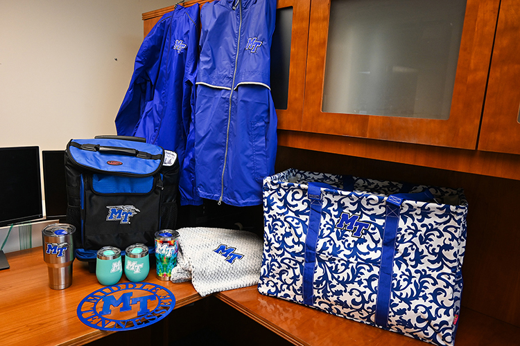 Middle Tennessee State University graduate students can sign up now to participate in the College of Graduate Studies’ “Campus Quest!” virtual scavenger hunt that will be available to play the first week of the fall 2022 semester, Aug. 22-26. Participating students will be entered into a drawing to win one of the pictured MTSU-themed prizes. (MTSU photo by Stephanie Barrette)