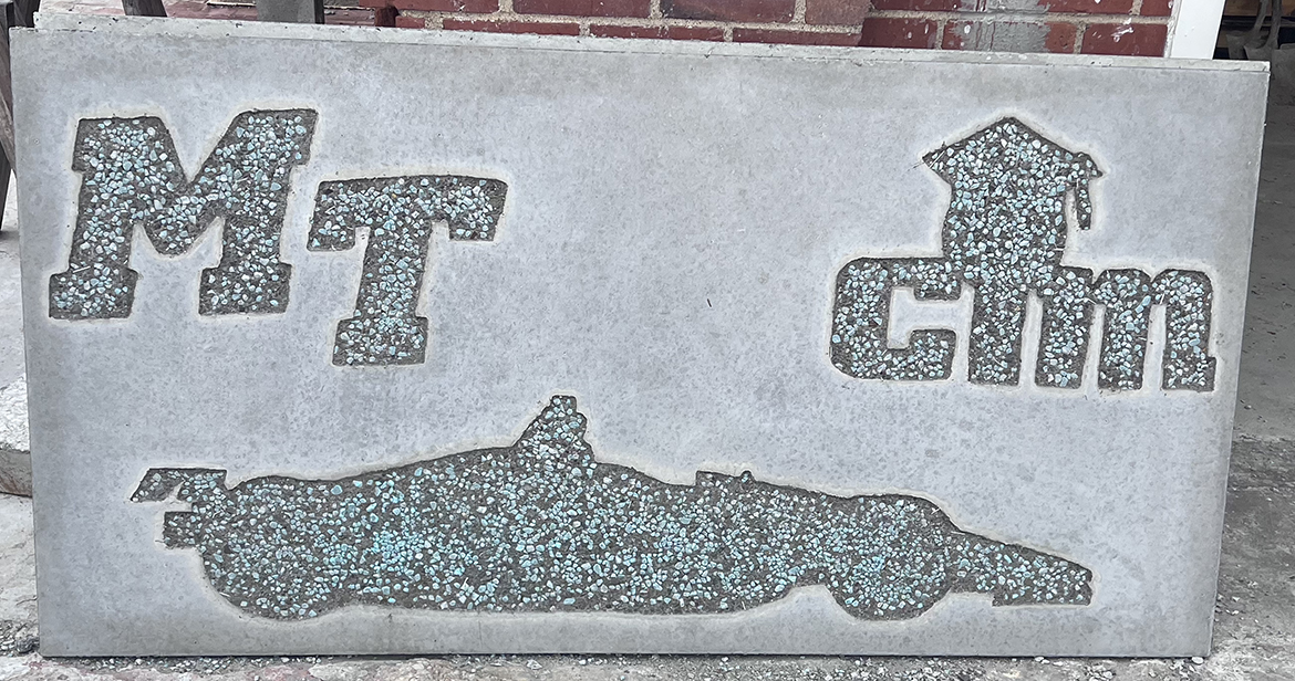 A concrete panel for the Music City Grand Prix will be on display Friday, Aug. 5, at the race track outside Nissan Stadium, home of the NFL Tennessee Titans, in Nashville, Tenn. The panel was created by CIM students Kayla and Ashley Gates. (Submitted photo)