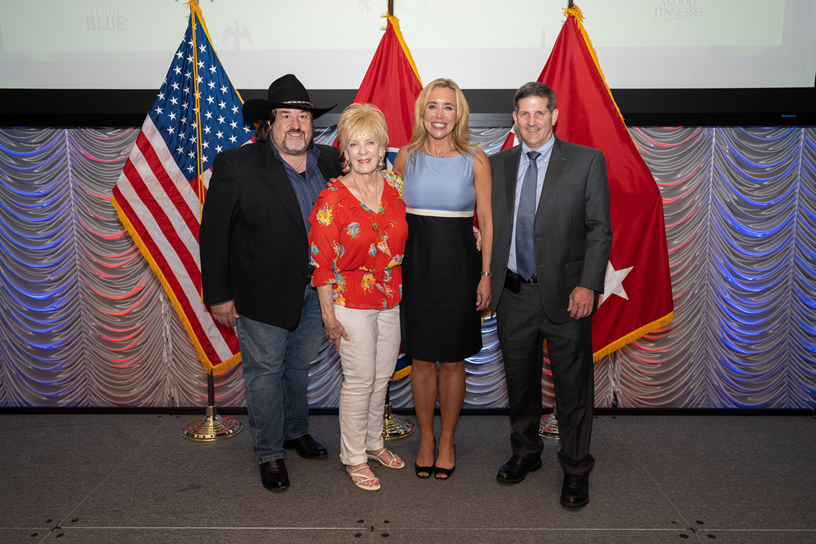 Among those attending the fifth annual Veteran Impact Celebration at MTSU in the Student Union Ballroom Thursday, Aug. 25, were, from left, Charlie Daniels Jr., Hazel Daniels, Daniels Center Director Hilary Miller and Jimmy Hiller, owner of title sponsor Hiller Plumbing, Heating, Cooling and Electrical. The MTSU veterans center is named for Hazel and the late country music legend Charlie Daniels. Hiller received the inaugural Veteran Employer Award. (MTSU photo by James Cessna)