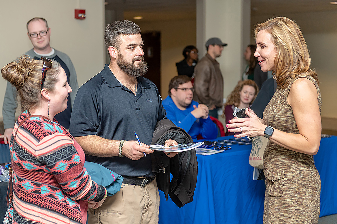 Daniels Veterans Center Director Hilary Miller, right, meets Richard Kanagie during a “Newcomers Briefing” in the James Union Building. The fall 2022 briefing gathering will be held Thursday, Aug. 18, in the Tom H. Jackson Building’s Cantrell Hall. (MTSU file photo by Eric Sutton)