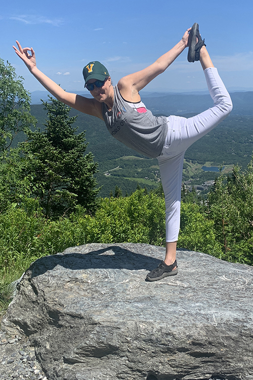 MTSU alumna and dietitian Monique Richard practices yoga atop Mount Mansfield in Vermont in this 2022 photo. Richard incorporates yoga in her practice of integrative and functional medicine. (Photo submitted)