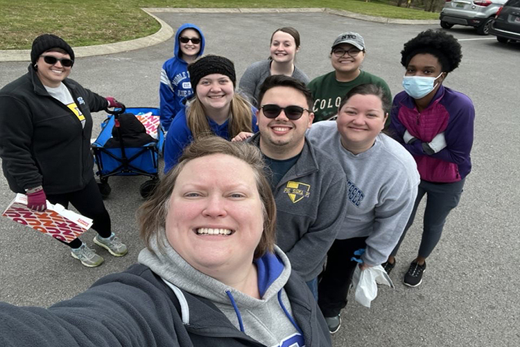 Members of Phi Sigma Pi Honor Fraternity and other alumni volunteers pose for a photo following their April 9 greenway cleanup. Participants are, from left, back row, Samantha Vredenberg-Roate, Reed Peachley, Kaitlyn Peck, Odette Rosales, Symone Randle; middle row, Abigail Miga, Nicole Widener; center, Wesley Doyle; front, Katie Peachley.