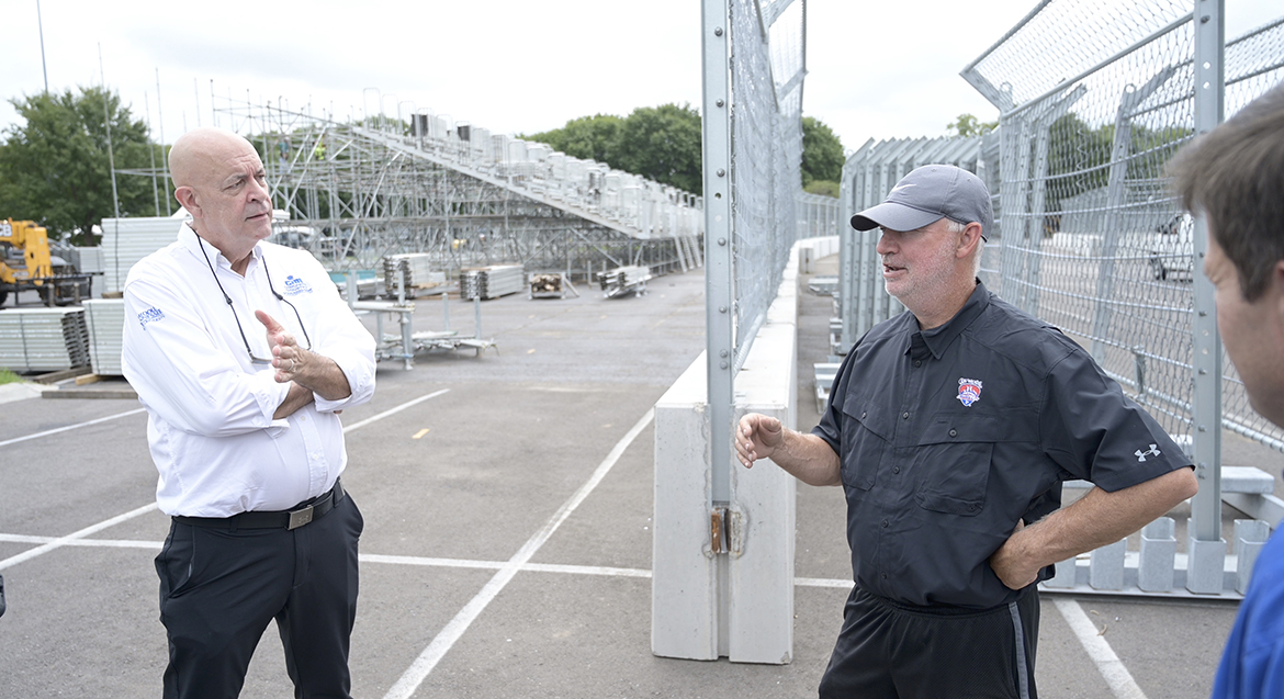 MTSU School of Concrete and Construction Director Kelly Strong, left, chats with Tony Cotman, track designer for the Big Machine Music City Grand Prix, with the featured race at 2:30 p.m. Sunday, Aug. 7, in downtown Nashville, Tenn., adjacent to Nissan Stadium. MTSU remains a strong partner with the Grand Prix. (MTSU photo by James Cessna)