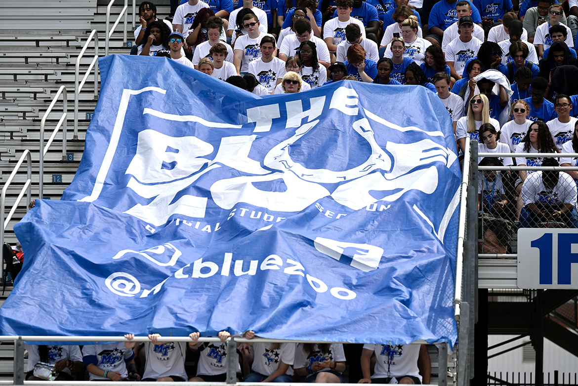 About 300 students from the Office of Student Success’s Scholars Academy and STAR early arrival programs help unfurl the Blue Zoo banner for the first time this academic year in the student section inside Floyd Stadium Wednesday, Aug. 17. The banner is unfurled each time the Blue Raider football team scores at home. (MTSU photo by J. Intintoli)