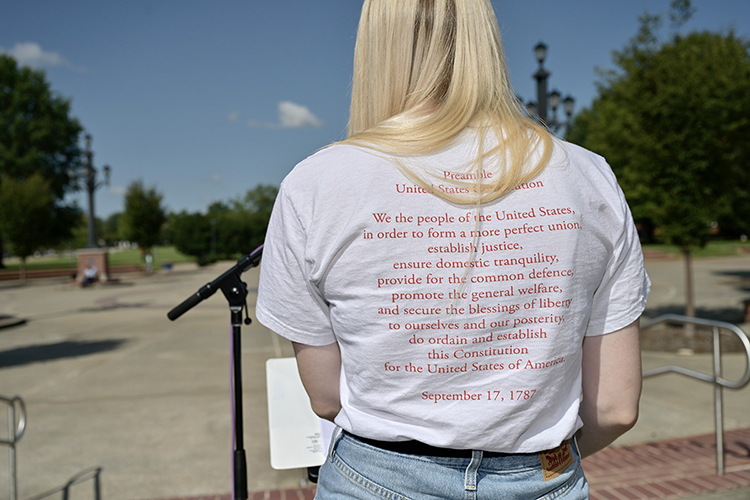 An MTSU student's T-shirt displays the preamble to the U.S. Constitution while she reads a portion of the historic document aloud Sept. 14 on the university quad as part of the university's annual Constitution Week observance. The MTSU chapter of the American Democracy Project, which created the shirts for members and supporters, organized three days of public readings of the Constitution across campus to mark the 235th anniversary of the Sept. 17 signing of the document and sponsored a special Sept. 19 workshop, “Grassroots Organizing and Movement Building Are in Tennessee’s DNA: Highlander Comes to MTSU" with the Rev. Allyn Maxfield-Steele, co-executive director of the historic Highlander Research and Education Center in East Tennessee. (MTSU photo by Andy Heidt)