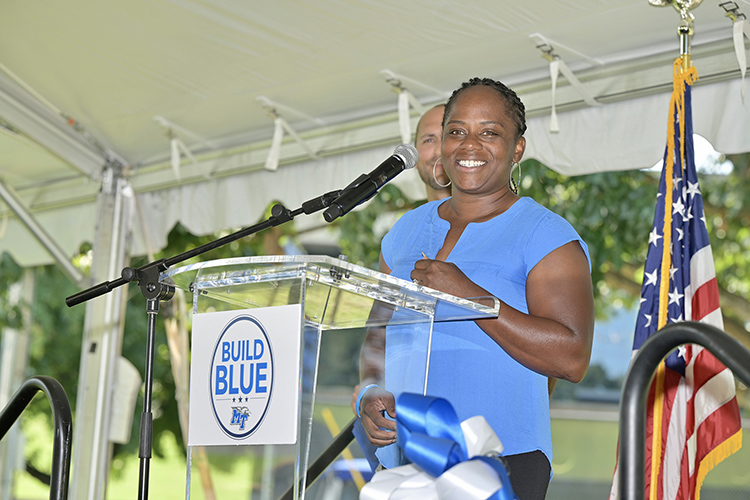 MTSU women's tennis coach Tayo Bailey-Duvall thanks supporters Thursday, Sept. 15, at the groundbreaking ceremony for the Blue Raiders' new outdoor tennis complex to be built near the corner of Middle Tennessee Boulevard and Greenland Drive where the current outdoor courts are located. Behind her is MTSU men's tennis coach Jimmy Borendame. (MTSU photo by Andy Heidt)