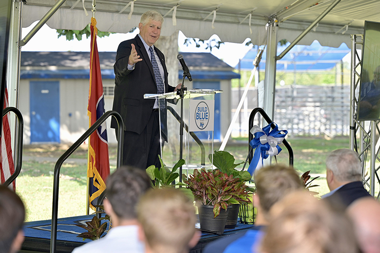 MTSU Director of Athletics Chris Massaro acknowledges the full tent of supporters Thursday, Sept. 15, at the groundbreaking ceremony for the Blue Raiders' new outdoor tennis complex to be built near the corner of Middle Tennessee Boulevard and Greenland Drive where the current outdoor courts are located. (MTSU photo by Andy Heidt)