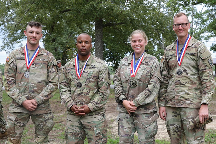 From left, Spc. Nathaniel Gust, Capt. Eric Cheatham, 2nd Lt. Sheridan Harrison, and Spc. Jacob Williams, all members of the Tennessee Army National Guard’s 253rd Military Police Company, finished in second place as a team at the Adjutant General Match, Aug. 19–21, at Tullahoma’s Volunteer Training Site. Harrison, an MTSU alumnus, placed first overall in the event, taking home honors as the top firer in the Tennessee National Guard. (U.S. Army National Guard photo by Sgt. 1st Class Timothy Cordeiro)