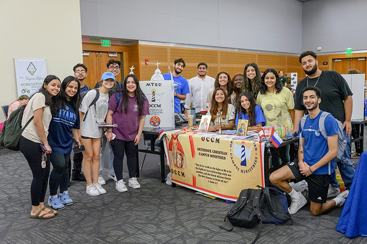 Members of the Orthodox Christian Ministry student organization pose for photo during the annual MTSU Student Organization Fair held Aug. 30 in the Student Union Ballroom. (MTSU photo by J. Intintoli)