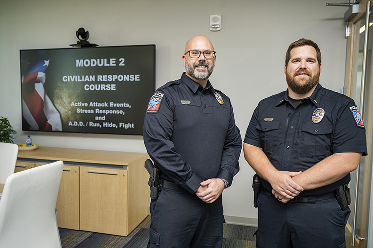 Sgt. Jason Hurley, left, and Lt. Jacob Wagner of the Middle Tennessee State University Police Department prepare to teach a civilian active shooter training course to a selection of university advisors at the Academic Classroom Building on campus on Sept. 15, 2022. (MTSU photo by Andy Heidt)