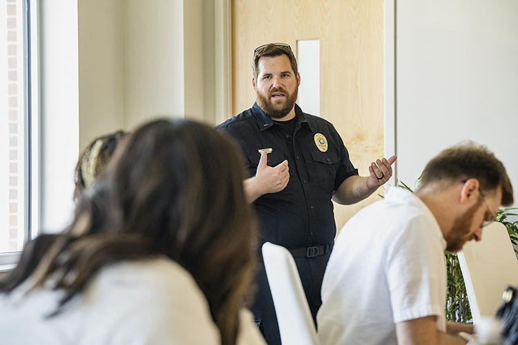 Lt. Jacob Wagner of the Middle Tennessee State University Police Department presents a civilian active shooter training course to a group of university academic advisors at the Academic Classroom Building on campus on Sept. 15, 2022. (MTSU photo by Andy Heidt)