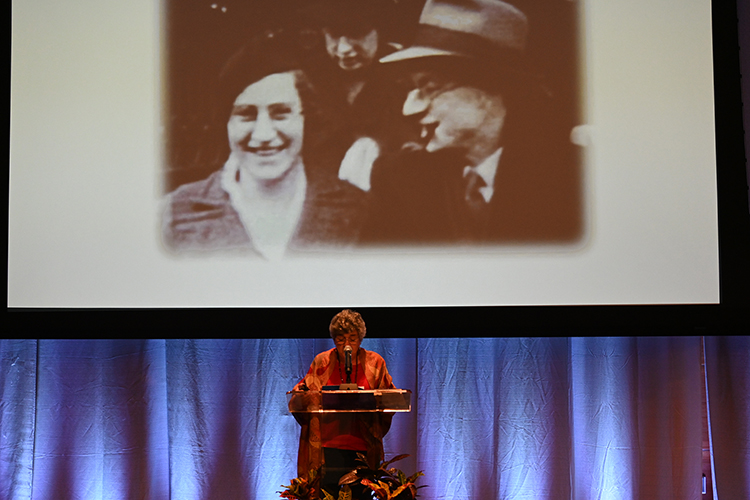 Child Holocaust survivor Sonja Dubois of Knoxville, Tenn., talks about the only photo she has of her biological parents, Sophie de Vries and Maurits van Thijn, during her Sept. 23 talk to close out the university’s 14th biennial Holocaust Studies Conference in the MTSU Student Union Ballroom. Captured from video footage from a wedding, the image wasn’t uncovered by Dubois until she was 60 years old. (MTSU photo by Jimmy Hart)
