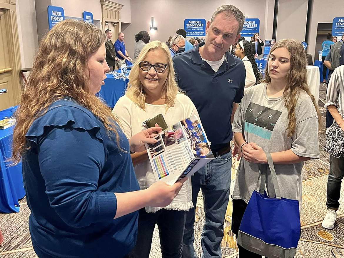 MTSU One Stop Director Becca Smitty, left, shares information about scholarships from a financial aid brochure with a family attending the university’s True Blue Tour recruiting event recently in Huntsville, Ala., at The Westin Hotel.
MTSU travels to 14 cities to recruit students for 2023 and beyond. (MTSU photo by Andrew Oppmann)
