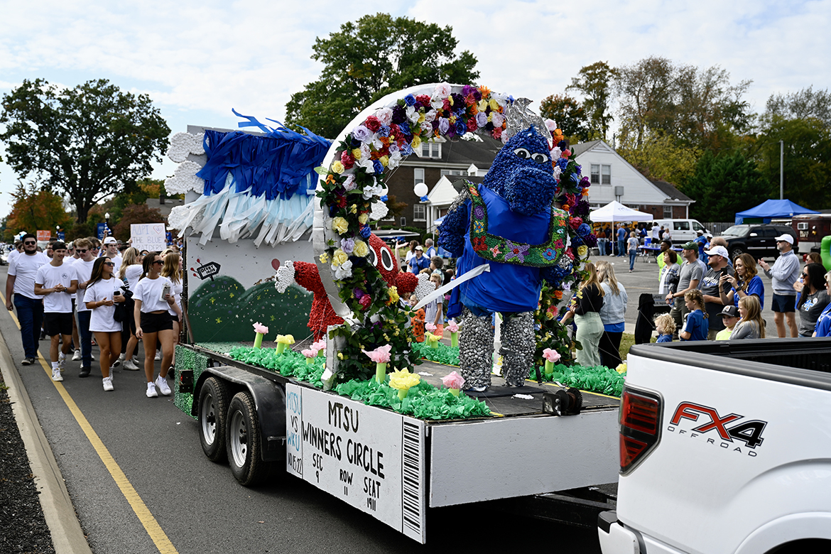 One of numerous Homecoming Parade entries, a student organization float with the “Winner’s Circle” theme heads down Middle Tennessee Boulevard in mid-October 2022. This year’s Homecoming Parade will be held at 11 a.m. Saturday, Sept. 23, starting on East Main Street and ending just past Falkinberry Drive. (MTSU file photo by J. Intintoli)