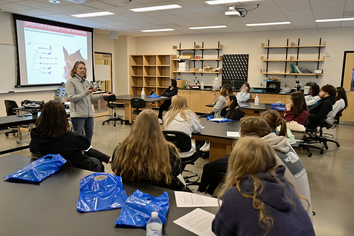 MTSU chemistry professor Sarah Bergemann discusses the evolution the coronavirus strains to a group of Riverdale High School Honors College students visiting the university Thursday, Oct. 20. The MTSU College of Basic and Applied Sciences and Riverdale have formed a partnership that may be a model with other high schools. (MTSU photo by Andy Heidt)