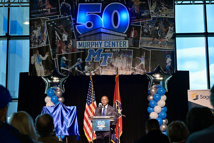 MTSU President Sidney A. McPhee welcomes attendees Tuesday, Oct. 18, to the kickoff event on the track concourse of the Murphy Center at Middle Tennessee State University for a yearlong celebration of the 50th anniversary of the iconic building, known affectionately as “The Glass House” and recently undergoing almost $6 million in renovations. (MTSU photo by Andy Heidt)