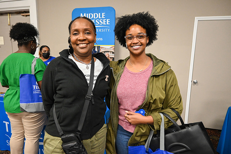 Tamika Reed, left, and Kendra Reed, both staffers from the Academy at Hickory Hollow, visited with the Middle Tennessee State University admissions department at the university’s True Blue Tour event at the Millennium Maxwell House in Nashville, Tenn., on Wednesday, Oct. 5, 2022. (MTSU photo by Stephanie Wagner)