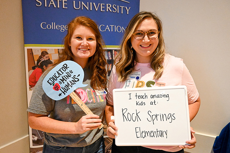Megan Smith, left, and Brooke Singleton, both teachers from Rock Springs Elementary in La Vergne, Tenn., enjoy the photo booth at the Sept. 27, 2022, Teacher Appreciation event put on by Middle Tennessee State University’s College of Education to honor local teachers, at the James Union Building on campus. (MTSU photo by Stephanie Wagner)