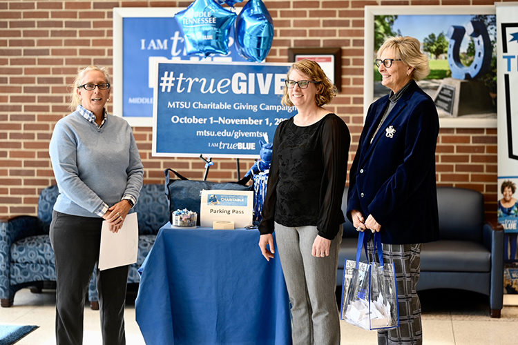 From left, James E. Walker Library Dean Kathleen Schmand, College of Graduate Studies Associate Dean Dawn McCormack and MT Athletics Senior Associate Athletic Director Diane Turham conduct one of the weekly drawings in the Cope Administration Building lobby as part of the 2022-23 MTSU Employee Charitable Giving Campaign. (MTSU photo by J. Intintoli)