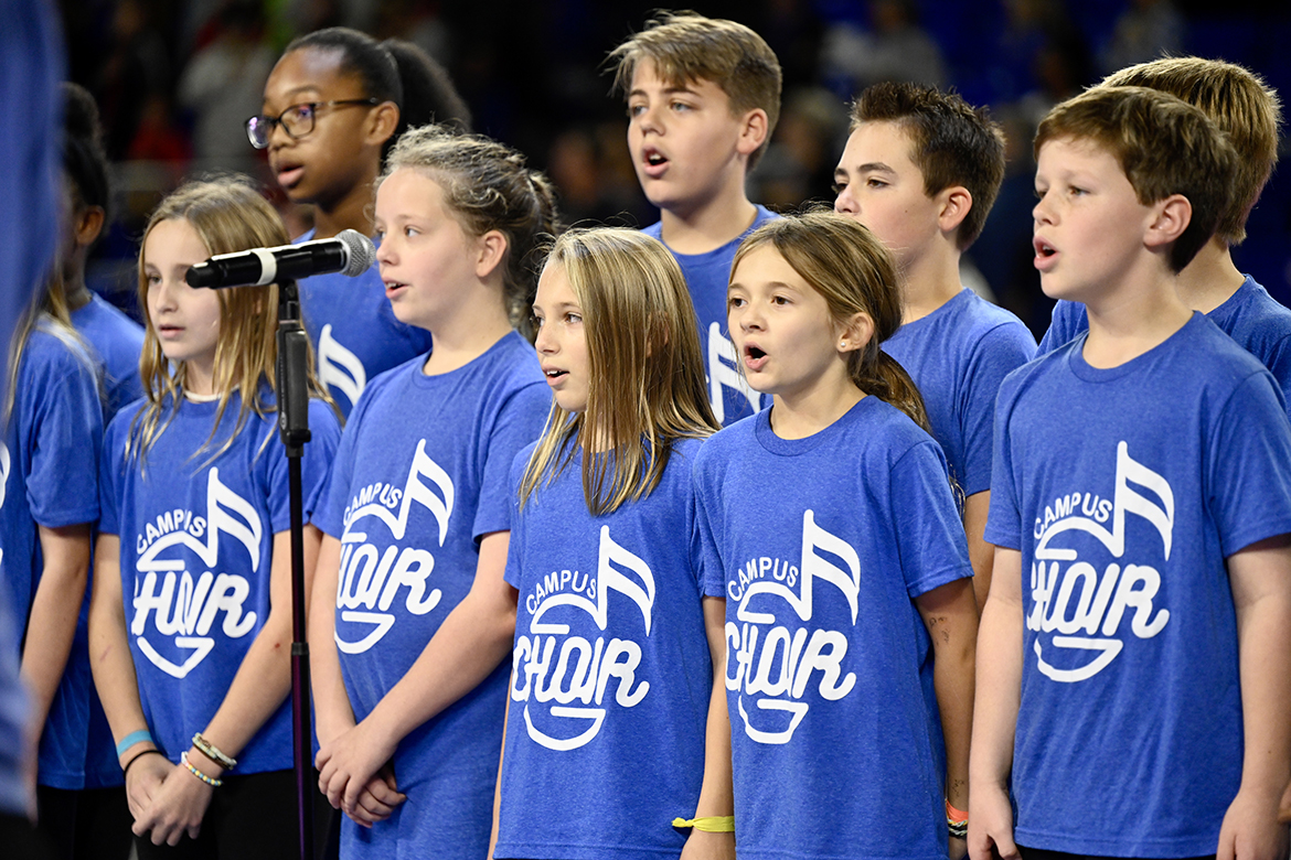 Choir members from Homer Pittard Campus School sing the national anthem Monday, Nov. 7, during the MTSU Education Day men’s basketball game in Murphy Center. The MTSU Blue Raiders defeated Brescia University in the season opener. (MTSU photo by J. Intintoli)