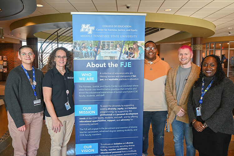 Staff from Middle Tennessee State University’s Center for Fairness, Justice and Equity recently hosted a lunch-and-learn for faculty about neurodiversity in the classroom on Nov. 30, 2022, at the College of Education building. Standing, from left, are Salem Horn, Lisa Strayer, Jadon Vanzant, Austin Dooley and Director Michelle Stevens. (MTSU photo by Stephanie Wagner)