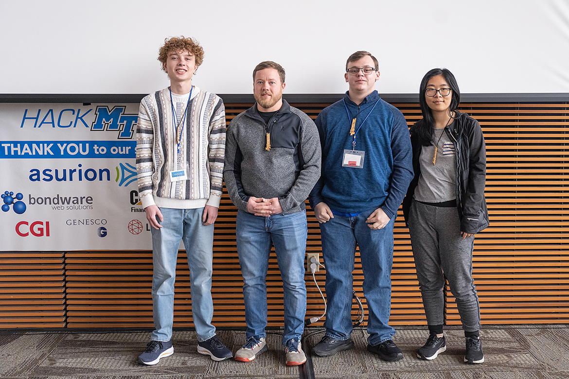 The 2023 Middle Tennessee State University HackMT judges’ first-place award went to the team nicknamed “777” on the final day of the 36-hour marathon hackathon in the MTSU Science Building Sunday, Jan. 29. Ten teams and 80 combined students and industry reps competed. (MTSU photo by Cat Curtis Murphy)