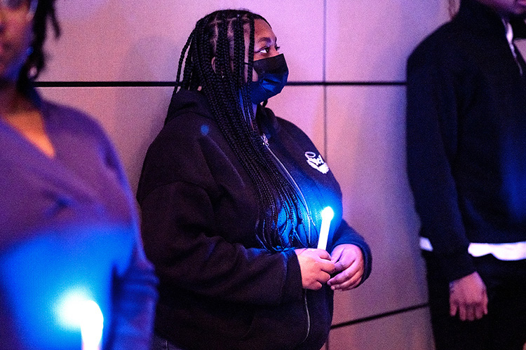 Attendees at MTSU’s 2023 MLK Celebration and Candlelight Vigil hold blue-lit LED candles at the conclusion of the program held in the Student Union Ballroom. The 2024 event will be held at 6 p.m. Monday, Jan. 15, in the same location. (MTSU file photo by Cat Curtis Murphy)