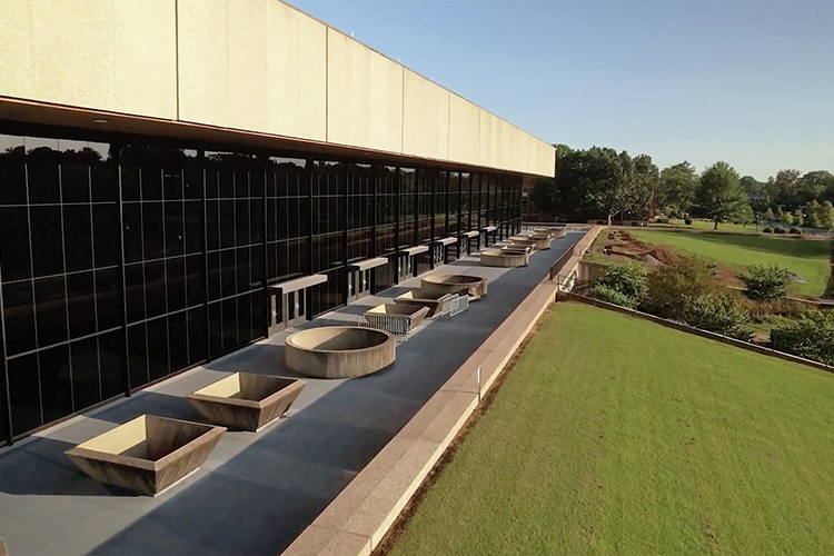 This view of the west side of Murphy Center at Middle Tennessee State University shows the numerous panels of SageGlass smart windows that were installed to reduce the glare and heat inside the facility by automatically tinting and clearing in response to the sun. (Video screen capture)