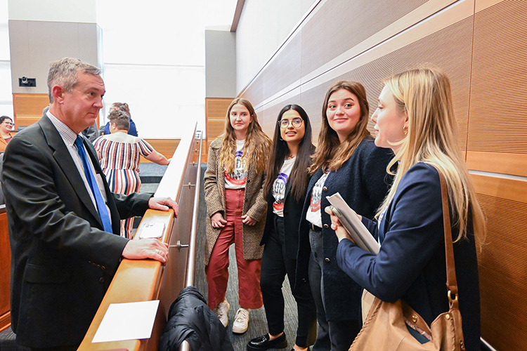 Tennessee Secretary of State Tre Hargett, left, speaks to Middle Tennessee State University students and members of the American Democracy Project, from right, Kayla Jenkins, Stevie Naumcheff, Elaf Alkazzaz and Victoria Grimsby at the Thursday, Jan. 26, 2023, Student Government Association meeting on campus where Hargett presented the university with the award for winning his College Voter Registration Competition for the second time. (MTSU photo by Stephanie Wagner).