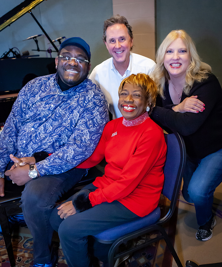 Nashville gospel artist Brenda Ivey Robertson, seated in center, was treated to a special recording session Saturday, Feb. 18, 2023, at Middle Tennessee State University in Murfreesboro, Tenn. Also pictured is her pianist for the session, Daryl Bowers, left, MTSU Recording Industry Chair John Merchant, top center, and MTSU College of Media and Entertainment Dean Beverly Keel, right. Merchant recorded the session, which was arranged by Keel, inside MTSU Bragg Media and Entertainment Building. (MTSU photo by Tom Beckwith)