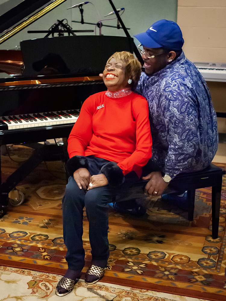 Nashville gospel artist Brenda Ivey Robertson, seated left, shares a laugh with pianist Daryl Bowers before a special recording session for Robertson held Saturday, Feb. 18, 2023, at Middle Tennessee State University in Murfreesboro, Tenn. (MTSU photo by Tom Beckwith)