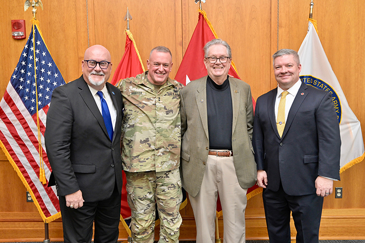 Army Reserve Maj. Gen. Bob D. Harter, second from left, visits the Middle Tennessee State University campus Wednesday, Feb. 15. Pictured, from left, inside the Student Union Building President’s Executive Conference Room are Andrew Oppmann, MTSU vice president for marketing and communications and an Army Reserve ambassador; Harter; and Army Reserve Ambassadors John Dyess and Travis Burchett. (MTSU photo by Andy Heidt)