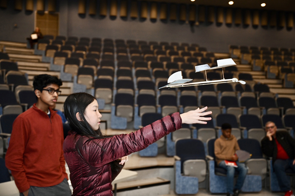 Ravenwood High School teammates Chetan Yenigalla, left, and Sophia Wang watch the takeoff of the airplane they created and designed as part of the 28th annual Regional Science Olympiad, held Saturday, Feb. 18, at Middle Tennessee State University. Their effort helped the Brentwood, Tenn., high school earn first-place honors and advance to the April 1 Science Olympiad State Tournament at the University of Tennessee-Knoxville. (MTSU photo by James Cessna)