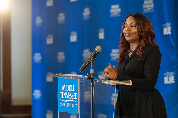 MTSU Health and Human Performance professor Chandra Russell Story gives remarks after accepting the 2023 John Pleas Faculty Recognition Award during a special ceremony Tuesday, Feb. 21, at the Ingram Building’s MT Center. (MTSU photo by Cat Curtis Murphy)