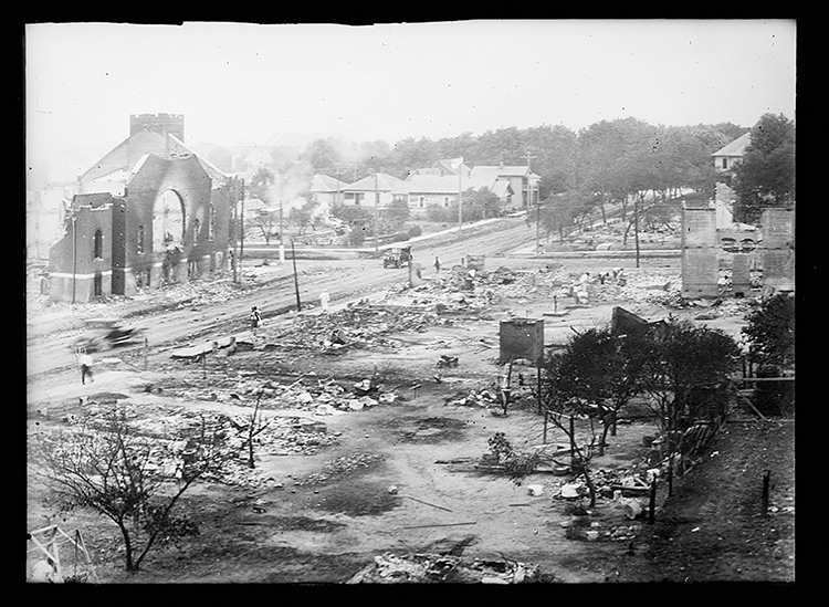 This June 1921 image from the Library of Congress' American National Red Cross photograph collection shows ruins of buildings, including a church, destroyed during the Tulsa Race Massacre, also called the Tulsa Race Riot, when a white mob attacked the predominantly African American Greenwood neighborhood of Tulsa, Okla. Forensic anthropologist Phoebe Stubblefield, interim director of the C.A. Pound Human Identification Laboratory at the University of Florida and lead investigator for the 1921 Tulsa Race Massacre project, will speak at MTSU Thursday, March 30, at 6:30 p.m. with a free public update on the investigation. (photo courtesy of the Library of Congress)