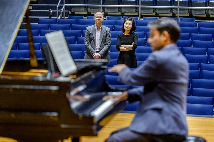 MTSU piano professor Arunesh Nadgir rehearses Debussy's "Clair de Lune" on a Steinway concert grand piano in Hinton Hall on campus to prepare for the School of Music's "Steinway Anniversary Celebration Concert" on Tuesday, April 4, as fellow professors Adam Clark, left, and Eunbyol Ko, center, look on. The free public concert, planned for 7:30 p.m., will feature a “piano extravaganza” of performances by MTSU students, faculty and alumni to showcase both their talent and the unmistakable tones of the Steinway. MTSU, which has 60 grand and upright Steinways, is marking its 20th anniversary as one of 200-plus "All-Steinway Schools" in the world and the first designated as such in Tennessee. (MTSU photo by J. Intintoli)