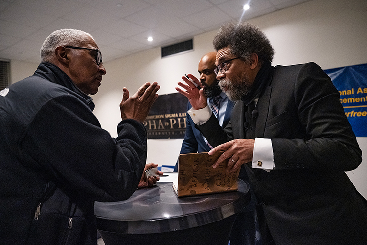 Author and philosopher Cornel West, right, chats with local businessman Tom Clark during a meet-and-greet following the fourth “State of the African American Union” address held Friday, Feb. 24, in the Tennessee Room of the James Union Building at Middle Tennessee State University in Murfreesboro, Tenn. (MTSU photo by Cat Curtis Murphy)
